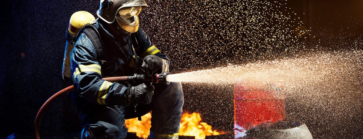 anonymous-fireman-fighting-fire-with-water-2022-03-04-06-14-44-utc(1)